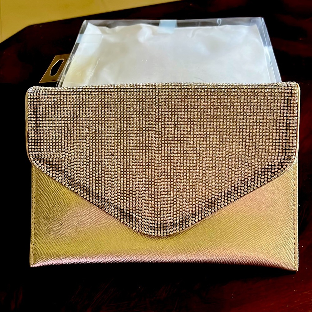 New never used gold evening bag